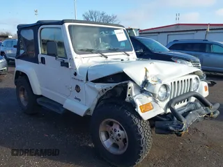 2002 Jeep Wrangler Sahara with VIN 1J4FA59S62P772256, listed as a IAAI auction lot 41968844 with 170,218 mi miles. Bid and sale history available at carsss.com. Image 1.