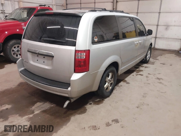 2008 Dodge Grand Caravan SXT with VIN 1D8HN54P18B129536, listed as a IAAI auction lot 41844874 with 260,000 mi miles and . Bid and sale history available at DreamBid. Image 4.