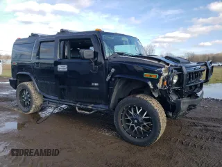 2005 Hummer H2 SUV with VIN 5GRGN23U35H111403, listed as a Copart auction lot 84720994 with 142,159 mi miles and Salvage Title. Bid and sale history available at carsss.com. Image 4.
