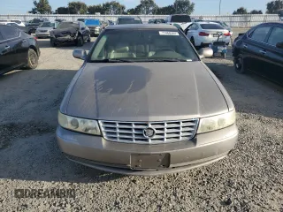 2002 Cadillac Seville Luxury SLS z VIN 1G6KS54Y22U149573, wystawiony jako Copart lot #71468564 z przebiegiem 158 498 mil mil oraz Czysty tytuł • Clean title. Historia ofert i sprzedaży dostępna na DreamBid. Obrazek 5.