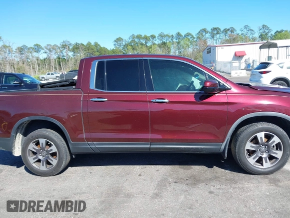2019 Honda Ridgeline RTL-E with VIN 5FPYK3F72KB024461, listed as a IAAI auction lot 41813568 with 122,364 mi miles and . Bid and sale history available at DreamBid. Image 12.