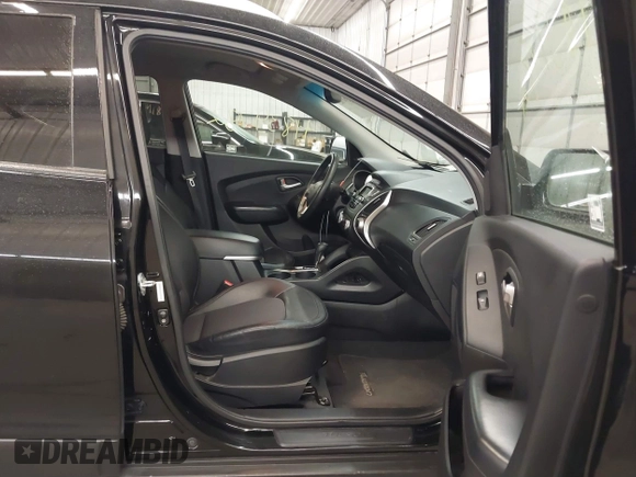2013 Hyundai Tucson GLS with VIN KM8JU3AC8DU557445, listed as a IAAI auction lot 41839782 with 153,769 mi miles. Bid and sale history available at carsss.com. Image 5.