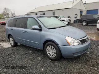 2012 Kia Sedona LX with VIN KNDMG4C70C6465733, listed as a Copart auction lot 52017215 with 149,800 mi miles and Salvage Title. Bid and sale history available at carsss.com. Image 4.