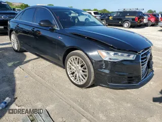 2016 Audi A6 Prestige with VIN WAUHGAFC9GN000885, listed as a Copart auction lot 53656633 with 98,685 mi miles and Salvage title. Bid and sale history available at DreamBid. Image 4.