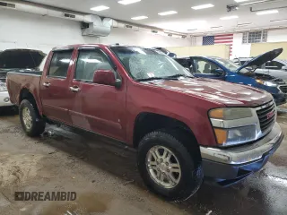 2009 GMC Canyon SLE1 z VIN 1GTDT13E298151328, wystawiony jako Copart lot #53660215 z przebiegiem 143 625 mil mil oraz Czysty tytuł • Clean title. Historia ofert i sprzedaży dostępna na DreamBid. Obrazek 4.