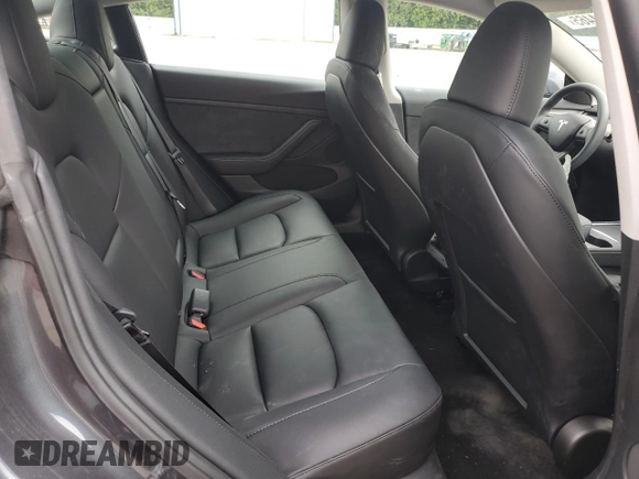 2023 Tesla Model 3 z VIN 5YJ3E1EA7PF683249, wystawiony jako Copart lot #56234465 z przebiegiem 9 494 mil mil oraz Szkoda całkowita • Salvage title. Historia ofert i sprzedaży dostępna na DreamBid. Obrazek 10.