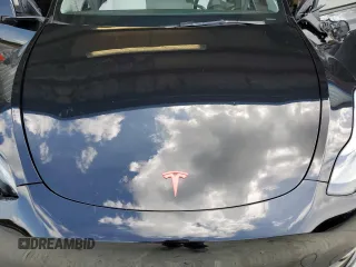 2024 Tesla Model Y Long Range z VIN 7SAYGDEEXRF072397, wystawiony jako Copart lot #61157535 z przebiegiem Nie podano mil oraz Szkoda całkowita • Salvage title. Historia ofert i sprzedaży dostępna na DreamBid. Obrazek 12.