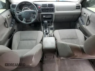 2004 Isuzu Rodeo S with VIN 4S2CK58W344311048, listed as a Copart auction lot 45154765 with 128,733 mi miles and Clean Title. Bid and sale history available at DreamBid. Image 8.