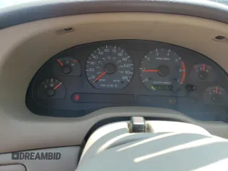 2003 Ford Mustang Deluxe with VIN 1FAFP44423F396045, listed as a Copart auction lot 60459935 with 243,215 mi miles and Salvage title. Bid and sale history available at DreamBid. Image 9.