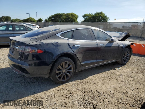 2014 Tesla Model S 60 with VIN 5YJSA1H13EFP38425, listed as a Copart auction lot 63686205 with 183,968 mi miles and Salvage title. Bid and sale history available at DreamBid. Image 3.