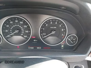2013 BMW 3 Series 328i xDrive with VIN WBA3B5C55DF590224, listed as a IAAI auction lot 41348272 with 117,392 mi miles. Bid and sale history available at carsss.com. Image 7.
