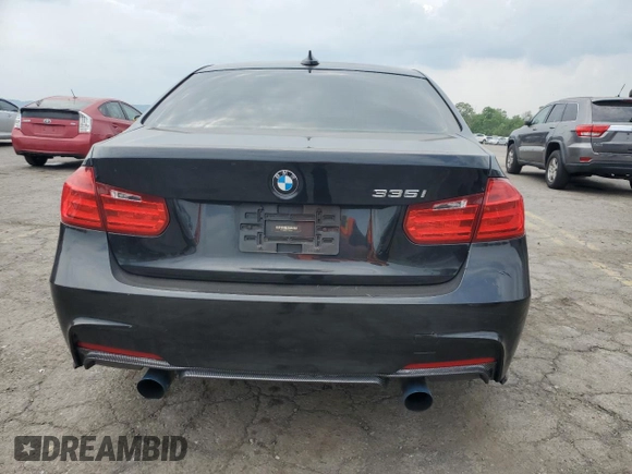 2015 BMW 3 Series 335i xDrive with VIN WBA3B9C57FF589960, listed as a Copart auction lot 59888575 with 69,919 mi miles and Salvage title. Bid and sale history available at DreamBid. Image 6.