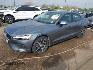 2019 Volvo S60 Momentum with VIN 7JR102FKXKG015965, listed as a IAAI auction lot 41156948 with 48,500 mi miles. Bid and sale history available at carsss.com. Image 2.
