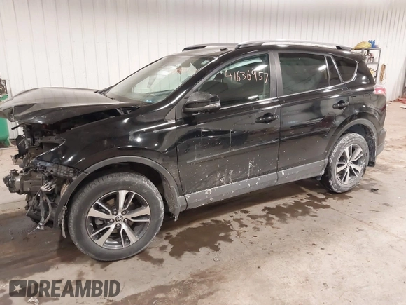 2018 Toyota RAV4 XLE with VIN 2T3RFREV3JW817989, listed as a IAAI auction lot 41636957 with 182,265 mi miles. Bid and sale history available at carsss.com. Image 2.