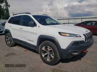 2014 Jeep Cherokee Trailhawk with VIN 1C4PJMBS5EW185510, listed as a Copart auction lot 55780005 with 130,358 mi miles and Clean title. Bid and sale history available at DreamBid. Image 4.