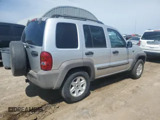 2003 Jeep Liberty Sport z VIN 1J4GK48K43W657028, wystawiony jako Copart lot #55070315 z przebiegiem 243 019 mil mil oraz Szkody całkowita. Historia ofert i sprzedaży dostępna na DreamBid. Obrazek 3.