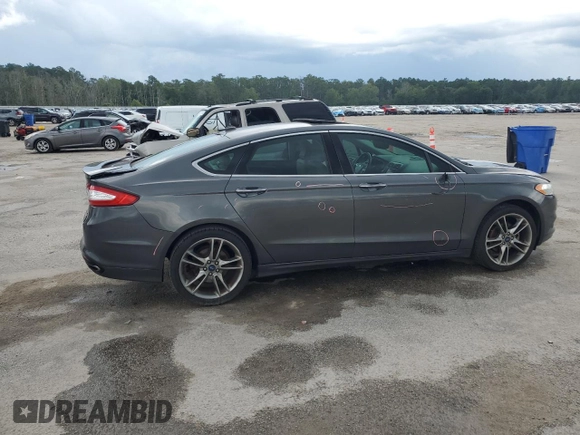 2016 Ford Fusion Titanium with VIN 3FA6P0K90GR180288, listed as a Copart auction lot 60218155 with 140,502 mi miles and Salvage title. Bid and sale history available at DreamBid. Image 3.