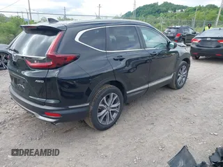 2021 Honda CR-V Touring with VIN 5J6RW2H92ML003064, listed as a IAAI auction lot 42298361 with 70,988 mi miles and . Bid and sale history available at DreamBid. Image 4.