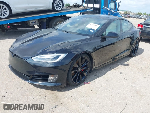 2017 Tesla Model S 100D z VIN 5YJSA1E45HF198921, wystawiony jako IAAI lot #42378026 z przebiegiem 104 967 mil mil oraz . Historia ofert i sprzedaży dostępna na DreamBid. Obrazek 2.