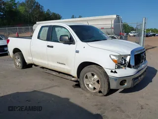2010 Toyota Tundra z VIN 5TFRM5F16AX007083, wystawiony jako IAAI lot #41985778 z przebiegiem 245 618 mil mil oraz . Historia ofert i sprzedaży dostępna na DreamBid. Obrazek 1.
