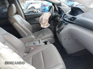 2014 Honda Odyssey EX-L with VIN 5FNRL5H67EB073640, listed as a IAAI auction lot 41115124 with 99,841 mi miles and . Bid and sale history available at carsss.com. Image 5.