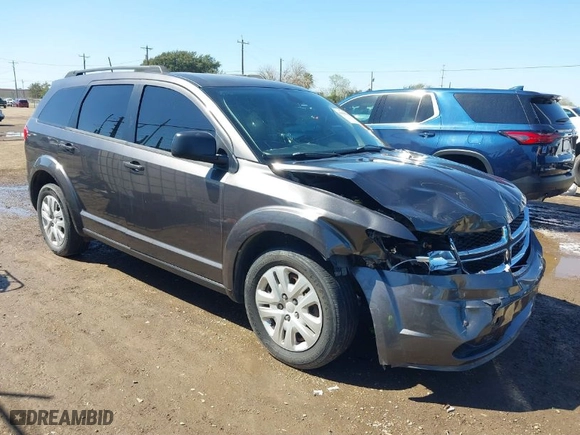 2018 Dodge Journey SE with VIN 3C4PDCAB1JT496404, listed as a IAAI auction lot 41646706 with 140,248 mi miles. Bid and sale history available at carsss.com. Image 1.