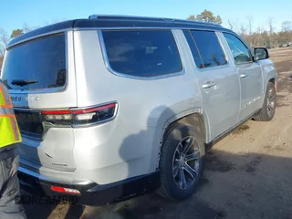 2022 Jeep Grand Wagoneer Series I with VIN 1C4SJVEJ9NS104227, listed as a IAAI auction lot 41421966 with 25,576 mi miles and . Bid and sale history available at DreamBid. Image 4.