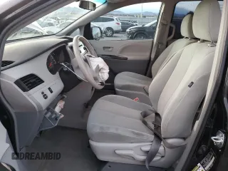2014 Toyota Sienna L with VIN 5TDZK3DC1ES486586, listed as a Copart auction lot 84680574 with 122,332 mi miles and Salvage Title. Bid and sale history available at carsss.com. Image 7.