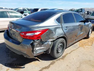 2016 Nissan Altima SR with VIN 1N4AL3APXGC197847, listed as a IAAI auction lot 41711136 with 130,826 mi miles and . Bid and sale history available at DreamBid. Image 4.
