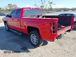 2018 Chevrolet Silverado 1500 LT with VIN 1GCRCREC1JZ170659, listed as a IAAI auction lot 41522588 with 129,412 mi miles and . Bid and sale history available at DreamBid. Image 3.