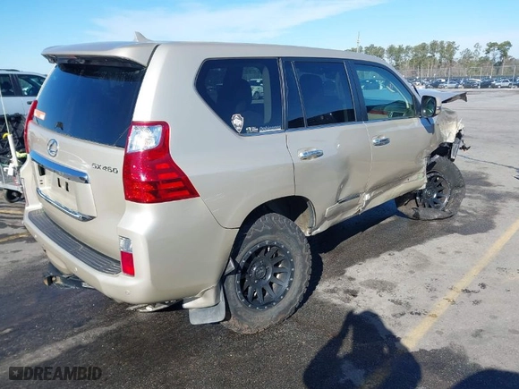 2012 Lexus GX 460 with VIN JTJBM7FX2C5040319, listed as a IAAI auction lot 41586258 with 125,859 mi miles. Bid and sale history available at carsss.com. Image 4.