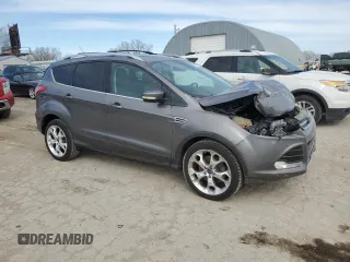 2013 Ford Escape Titanium z VIN 1FMCU9J90DUA72264, wystawiony jako Copart lot #49906445 z przebiegiem 126 527 mil mil oraz Szkoda całkowita • Salvage title. Historia ofert i sprzedaży dostępna na DreamBid. Obrazek 4.