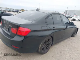 2013 BMW 3 Series 328i with VIN WBA3C1G59DNR47877, listed as a IAAI auction lot 41640493 with 106,689 mi miles and . Bid and sale history available at DreamBid. Image 4.