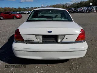 2000 Ford Crown Victoria LX z VIN 2FAFP74W0YX125595, wystawiony jako Copart lot #84675434 z przebiegiem 151 438 mil mil oraz Szkoda całkowita • Salvage title. Historia ofert i sprzedaży dostępna na DreamBid. Obrazek 6.