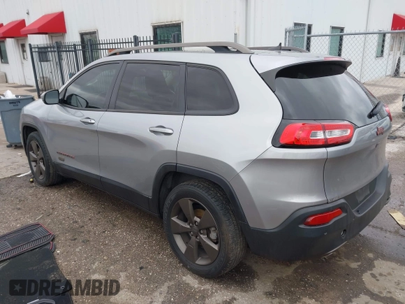 2016 Jeep Cherokee Latitude with VIN 1C4PJLCB5GW369955, listed as a IAAI auction lot 41297796 with 99,029 mi miles. Bid and sale history available at carsss.com. Image 3.