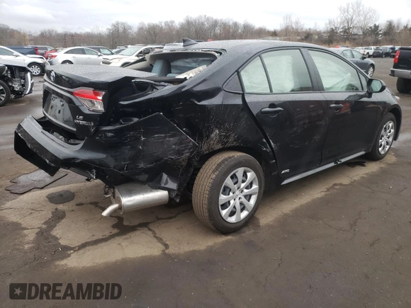 2023 Toyota Corolla Hybrid LE with VIN JTDBDMHE2P3002183, listed as a Copart auction lot 50292785 with 7,065 mi miles and Salvage Title. Bid and sale history available at carsss.com. Image 3.