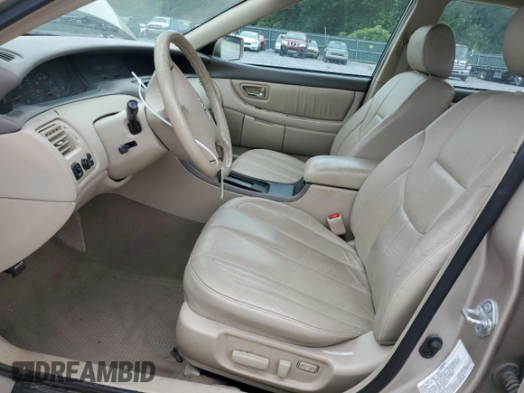 2003 Toyota Avalon XL z VIN 4T1BF28BX3U321934, wystawiony jako Copart lot #59497525 z przebiegiem 107 405 mil mil oraz Szkoda całkowita • Salvage title. Historia ofert i sprzedaży dostępna na DreamBid. Obrazek 7.