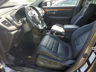 2019 Honda CR-V Touring with VIN 2HKRW2H90KH149664, listed as a Copart auction lot 52019525 with 147,649 mi miles and Salvage Title. Bid and sale history available at DreamBid. Image 7.