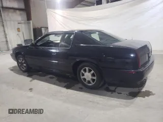 2000 Cadillac Eldorado Touring ETC z VIN 1G6ET1294YU144883, wystawiony jako Copart lot #80979854 z przebiegiem 89 271 mil mil oraz Czysty tytuł • Clean title. Historia ofert i sprzedaży dostępna na DreamBid. Obrazek 2.