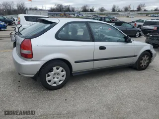 1999 Honda Civic DX with VIN 2HGEJ6446XH100761, listed as a Copart auction lot 84277854 with 82,619 mi miles and Clean Title. Bid and sale history available at carsss.com. Image 3.