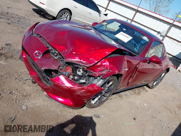 2020 Mazda MX-5 Miata Grand Touring z VIN JM1NDAM77L0418499, wystawiony jako IAAI lot #42010802 z przebiegiem 19 588 mil mil oraz . Historia ofert i sprzedaży dostępna na DreamBid. Obrazek 17.