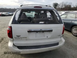 2001 Chrysler Town & Country LXi with VIN 2C8GP54L11R402563, listed as a Copart auction lot 86108164 with 179,021 mi miles and Salvage Title. Bid and sale history available at DreamBid. Image 6.