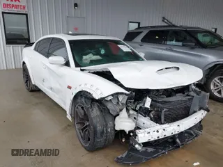 2021 Dodge Charger Scat Pack Widebody with VIN 2C3CDXGJ7MH579874, listed as a IAAI auction lot 41709662 with 61,869 mi miles. Bid and sale history available at carsss.com. Image 1.