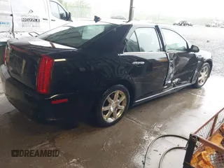 2011 Cadillac STS RWD w/1SB with VIN 1G6DW6ED1B0121186, listed as a IAAI auction lot 42094324 with 101,886 mi miles. Bid and sale history available at carsss.com. Image 4.