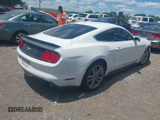 2016 Ford Mustang EcoBoost with VIN 1FA6P8TH4G5265481, listed as a IAAI auction lot 42337265 with 130,640 mi miles and . Bid and sale history available at DreamBid. Image 4.