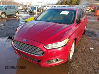 2015 Ford Fusion SE Hybrid with VIN 3FA6P0LUXFR282022, listed as a IAAI auction lot 41652820 with 210,865 mi miles. Bid and sale history available at carsss.com. Image 2.