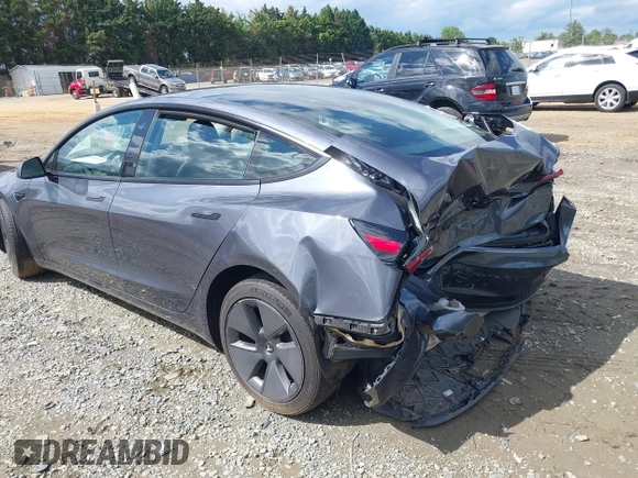 2023 Tesla Model 3 with VIN 5YJ3E1EA4PF515844, listed as a IAAI auction lot 42321123 with 46,683 mi miles and . Bid and sale history available at DreamBid. Image 3.