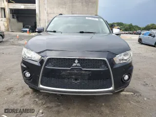 2010 Mitsubishi Outlander XLS with VIN JA4JT4AX5AZ009993, listed as a Copart auction lot 68136904 with 138,149 mi miles and Salvage Title. Bid and sale history available at carsss.com. Image 5.