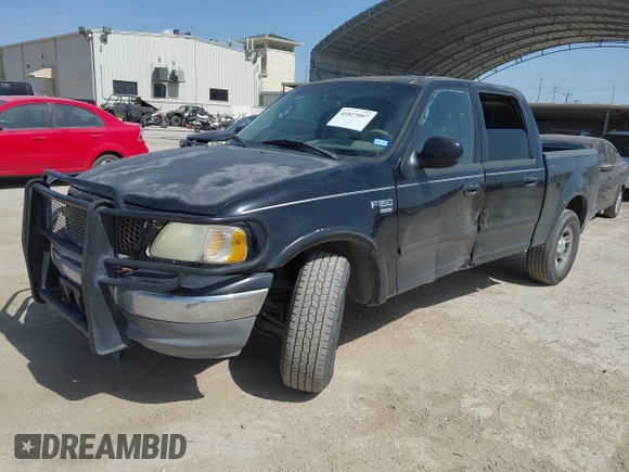 2003 Ford F-150 XLT with VIN 1FTRW07L53KC01651, listed as a IAAI auction lot 41827007 with 233,842 mi miles and . Bid and sale history available at DreamBid. Image 2.