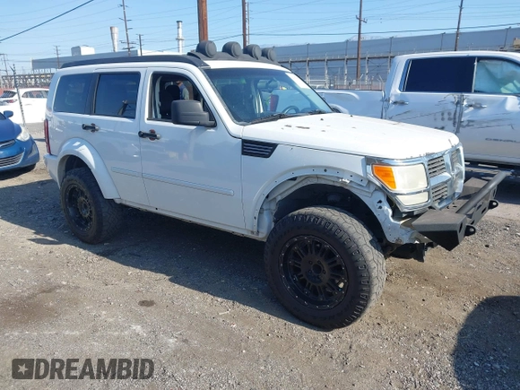 2011 Dodge Nitro Heat with VIN 1D4PT4GK9BW596989, listed as a IAAI auction lot 42397427 with 158,609 mi miles and . Bid and sale history available at DreamBid. Image 1.